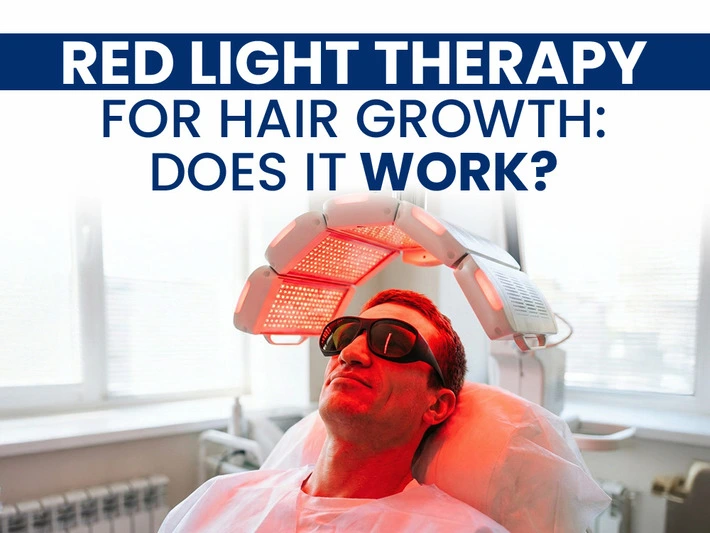 Man wearing protective goggles under a red light therapy device with text asking if red light therapy for hair growth works.